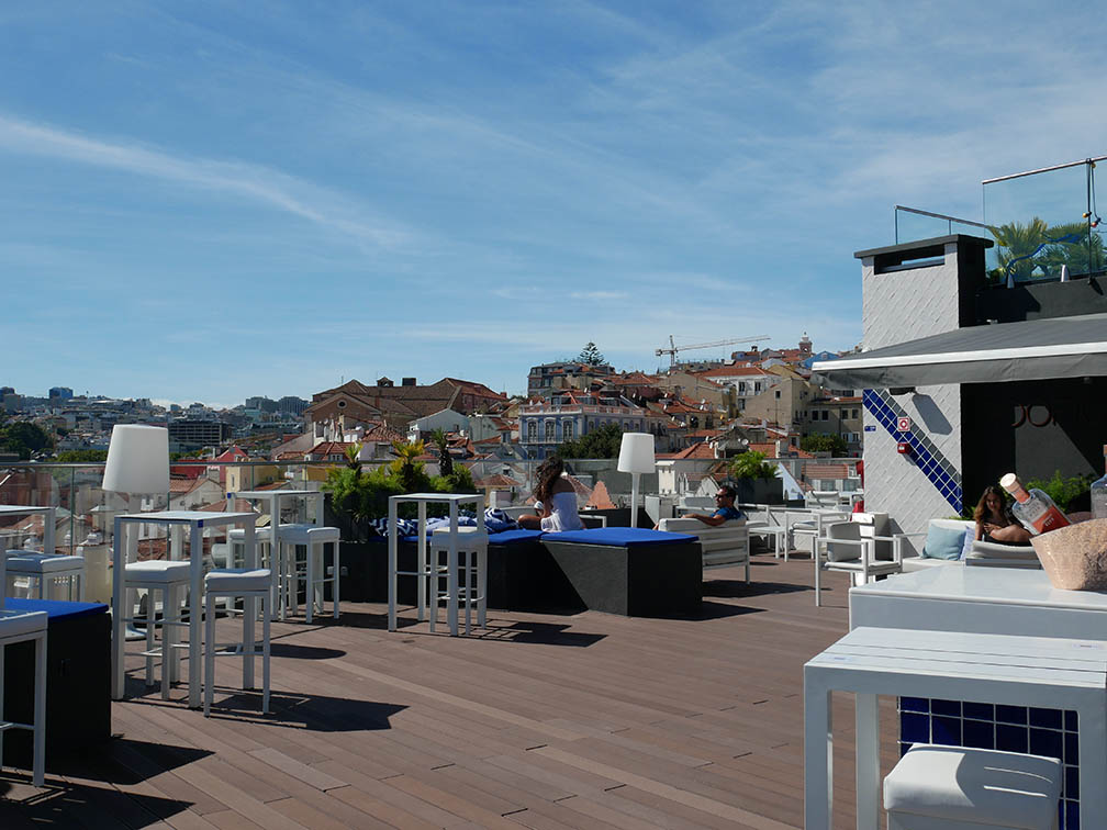 Roof terrace converted into a bar at the Hotel Mundia seen from the rooftops of downtown Lisbon